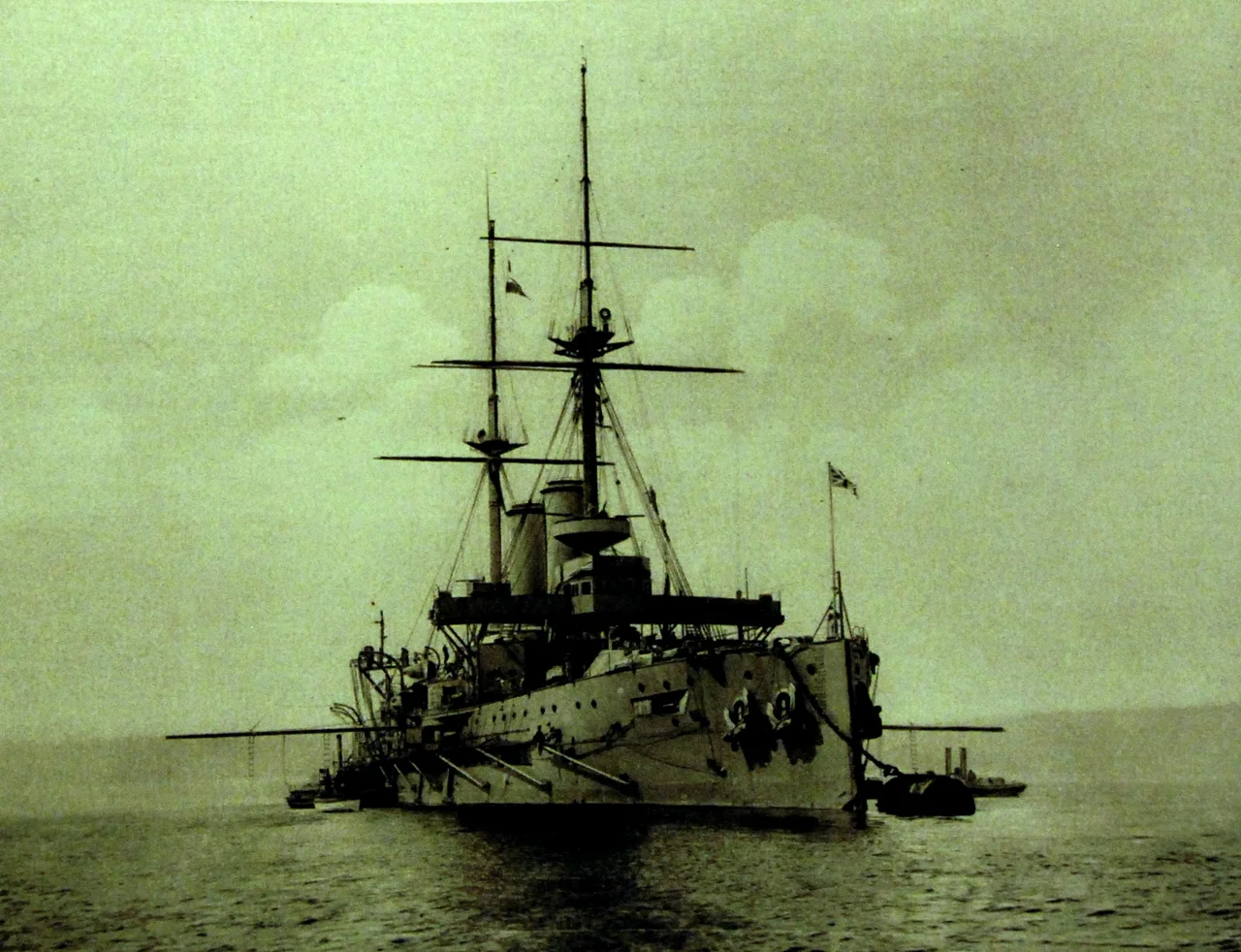 Lot 3447-6:  Royal Navy battleship HMS Formidable, starboard bow view.   On January 1, 1915, she was sunk by two German torpedoes while performing exercises in the English Channel.  Halftone image from the Booklet “The Great War in Pictures” showing the activities of the German armed forces during World War in 1915.  These were intended for propaganda purposes.   Published by “Deutscher Uberseedienst”, Berlin, Germany.  Edited by Jos. Schumacher, published by Georg Stilke.  (2015/10/16).