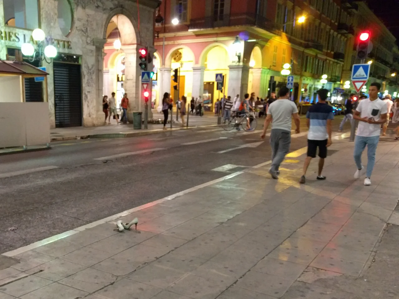 Shoes abandoned in the rush on the street of the Hôtel des Postes.