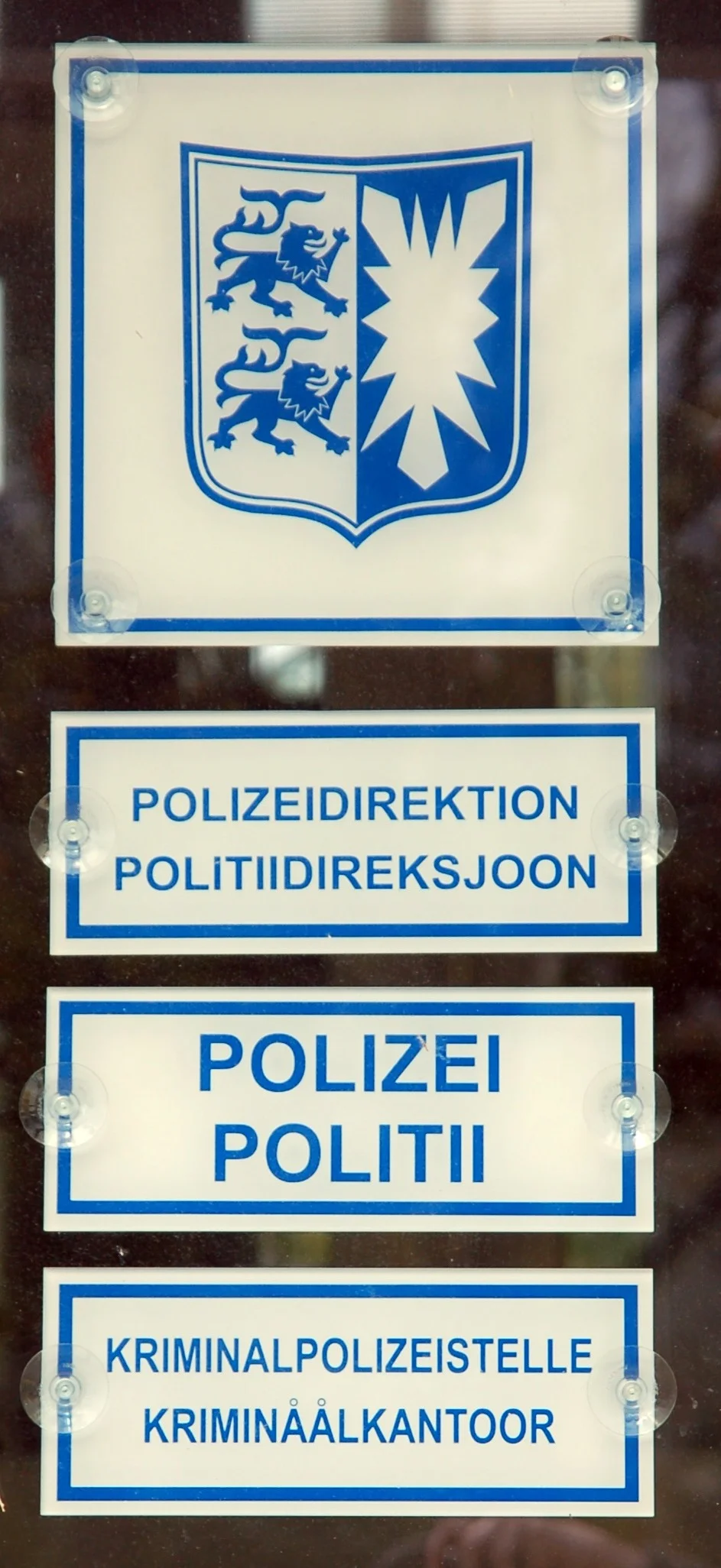 Bilingual signs German-Frisian at the police station in Husum, Germany.