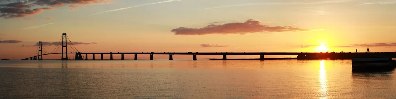 Panoramic photo of the Great Belt Fixed Link (the East Bridge) taken from Zealand side at sunset.